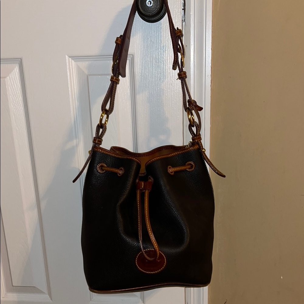 Elegant Dooney and Bourke Black and Brown Leather Bucket Bag